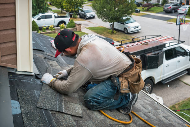 Professional Roofing technician working in New London, CT
